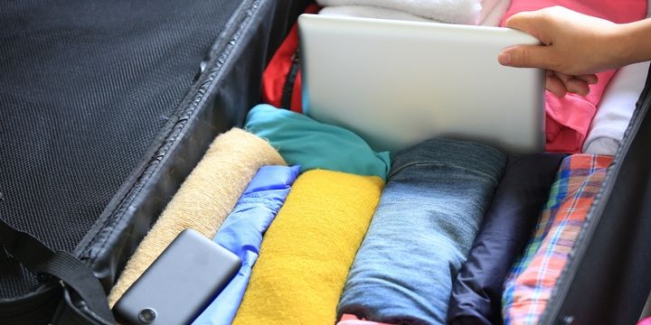 6 Smart Ways to Pack a Suitcase Long clothing is packed last